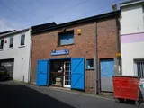 A 2 storey brick built terraced workshop store unit in central location in Torquay.