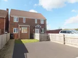 A well-presented 2 bedroom modern home set within a popular village location, with driveway parking, double glazing, gas