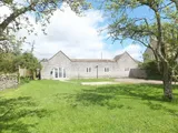 A three bedroom detached barn conversion set in a rural location. Has a  private driveway, large gardens to include a po
